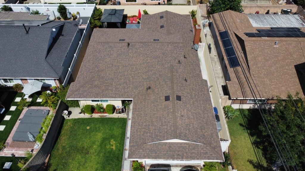 Aerial view of a brown shingle roof